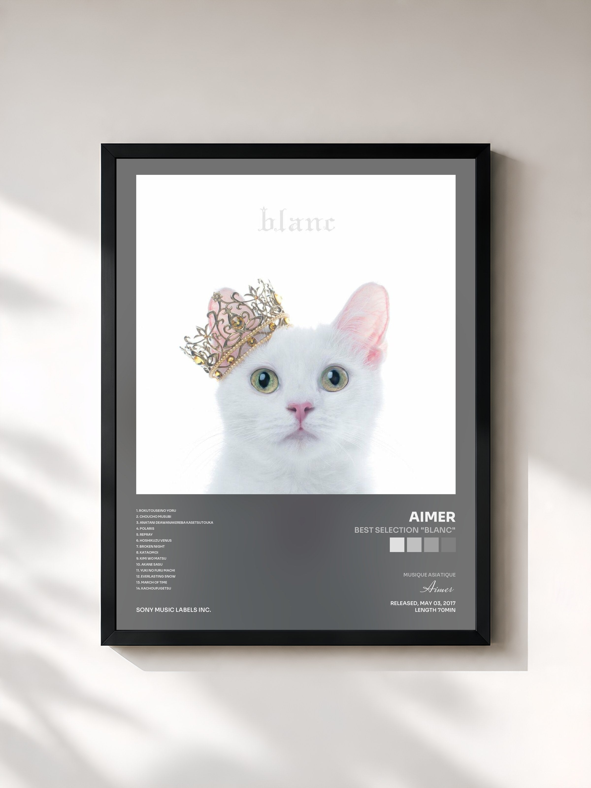 #noir Tableau de l'album BEST SELECTION "blanc" de Aimer, cadre noir, imprimé et encadré en France