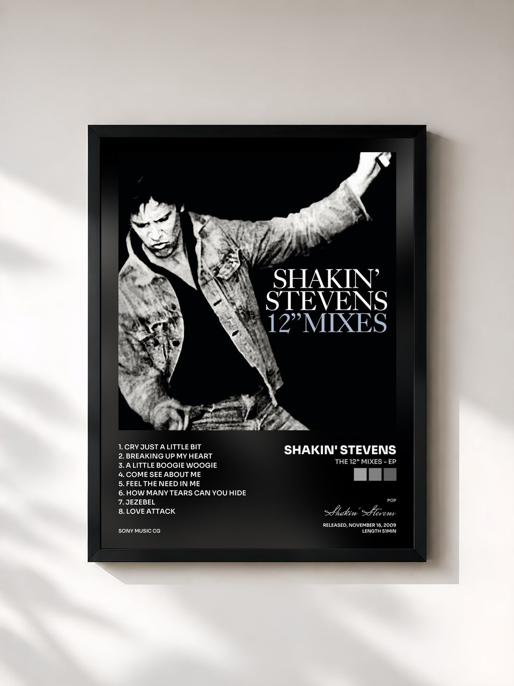 #noir Tableau de l'album The 12" Mixes - EP de Shakin' Stevens, cadre noir, imprimé et encadré en France