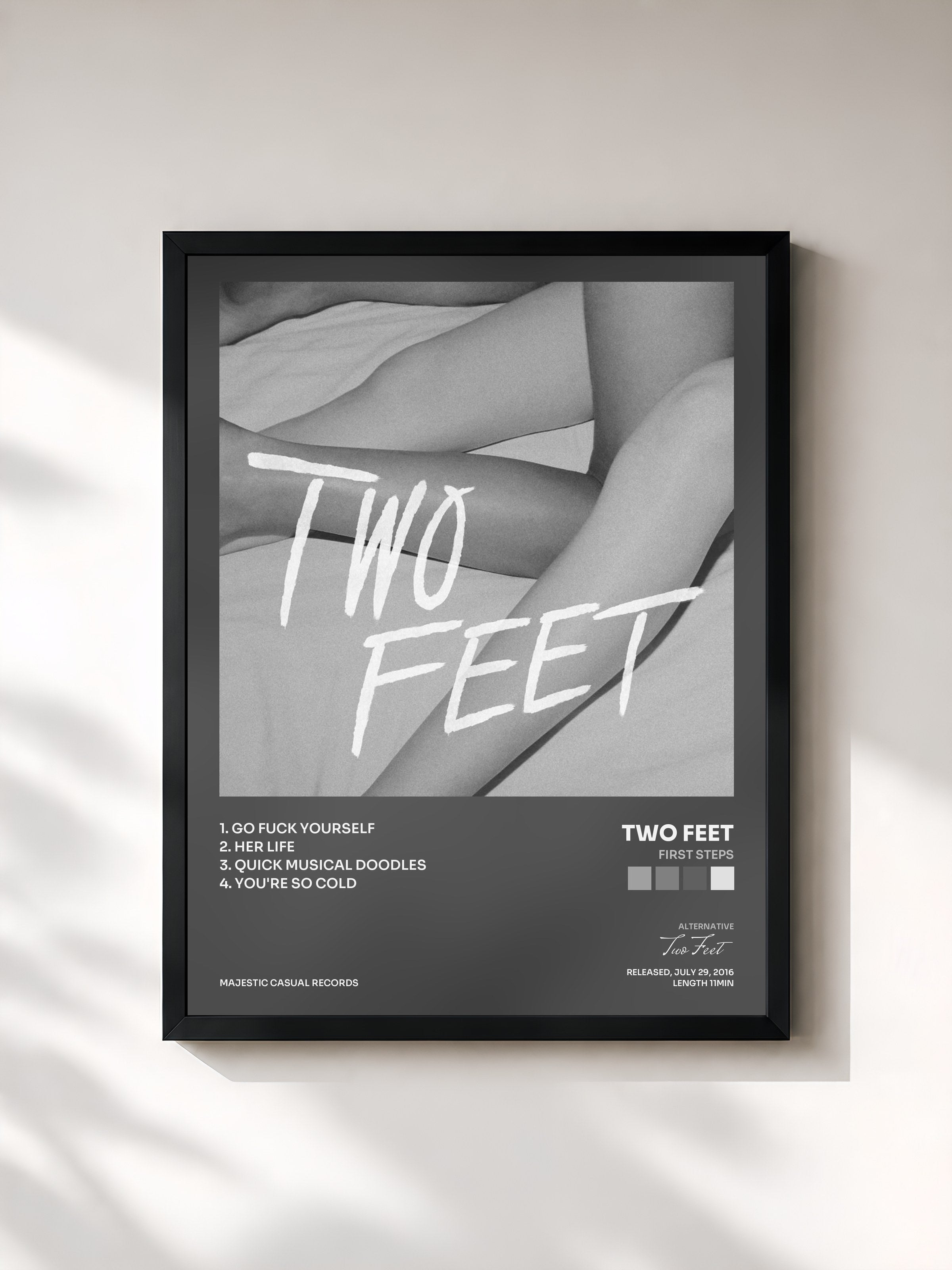 #noir Tableau de l'album First Steps de Two Feet, cadre noir, imprimé et encadré en France
