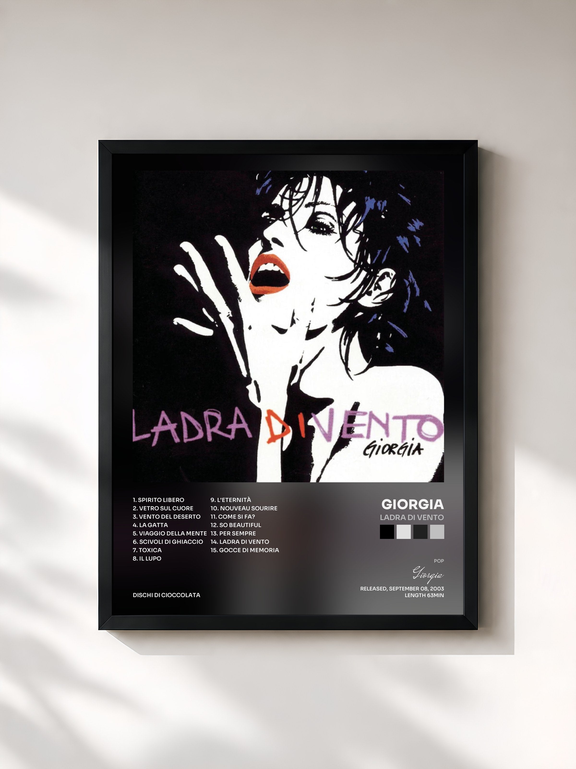#noir Tableau de l'album Ladra Di Vento de Giorgia, cadre noir, imprimé et encadré en France