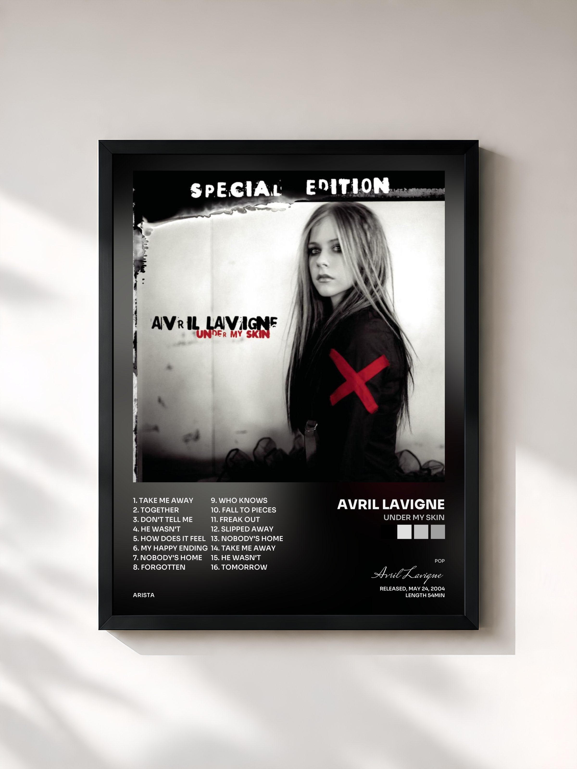 #noir Tableau de l'album Under My Skin de Avril Lavigne, cadre noir, imprimé et encadré en France