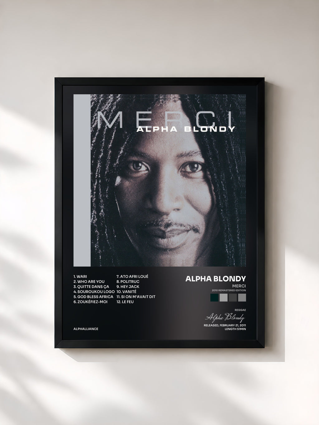 #noir Tableau de l'album Merci (2010 Remastered Edition) de Alpha Blondy, cadre noir, imprimé et encadré en France