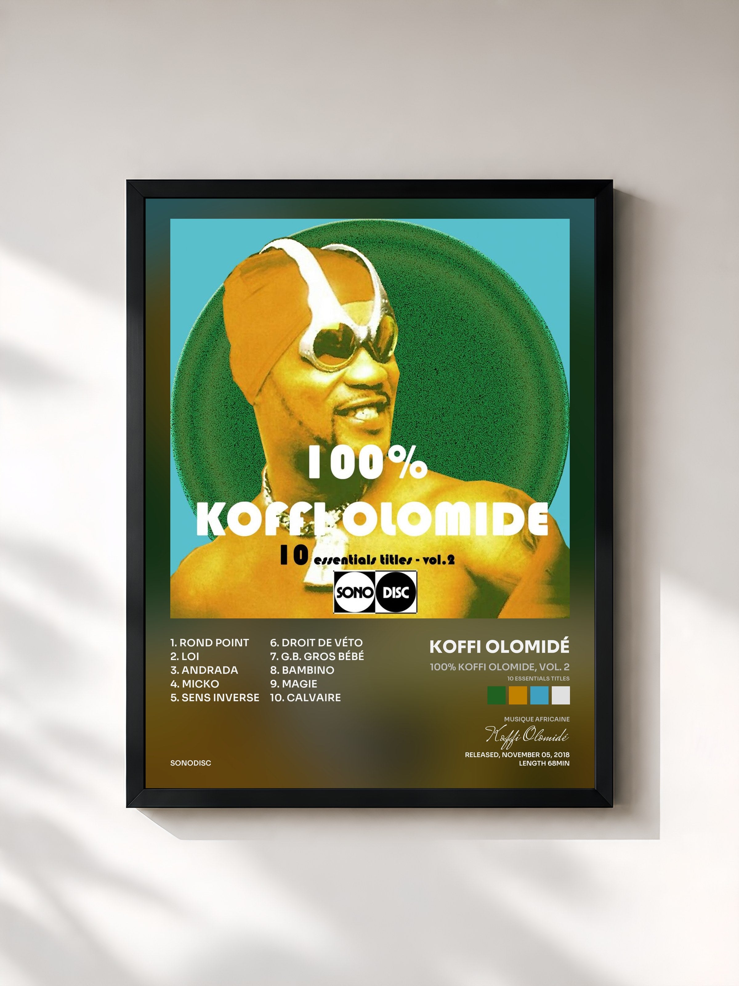 #noir Tableau de l'album 100% Koffi Olomide, vol. 2 (10 Essentials Titles) de Koffi Olomidé, cadre noir, imprimé et encadré en France