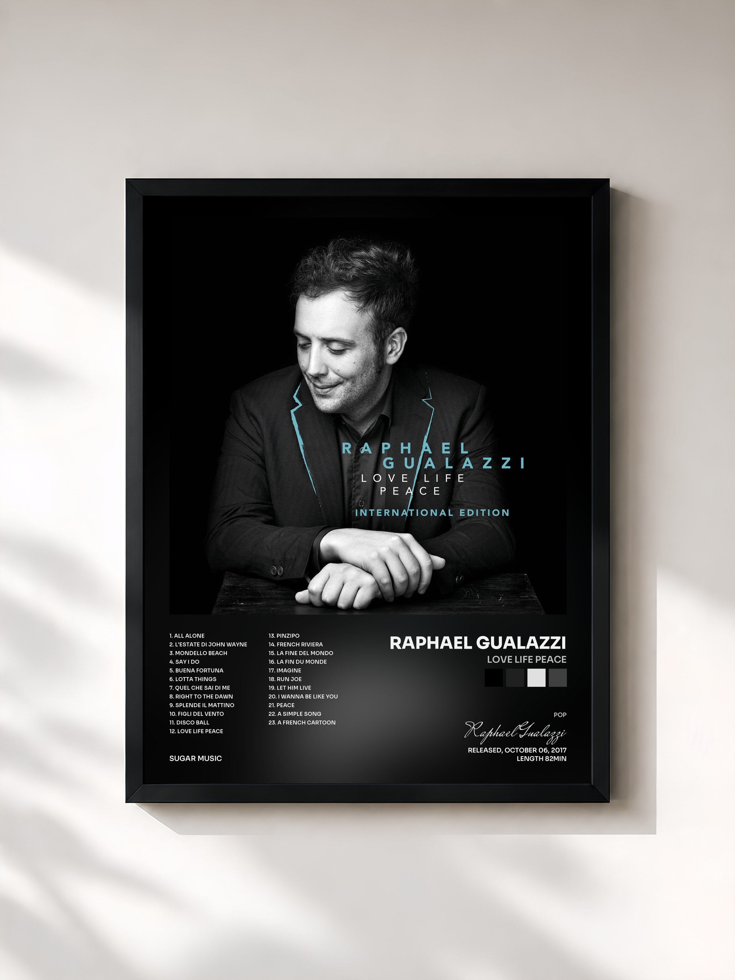 #noir Tableau de l'album Love Life Peace de Raphael Gualazzi, cadre noir, imprimé et encadré en France
