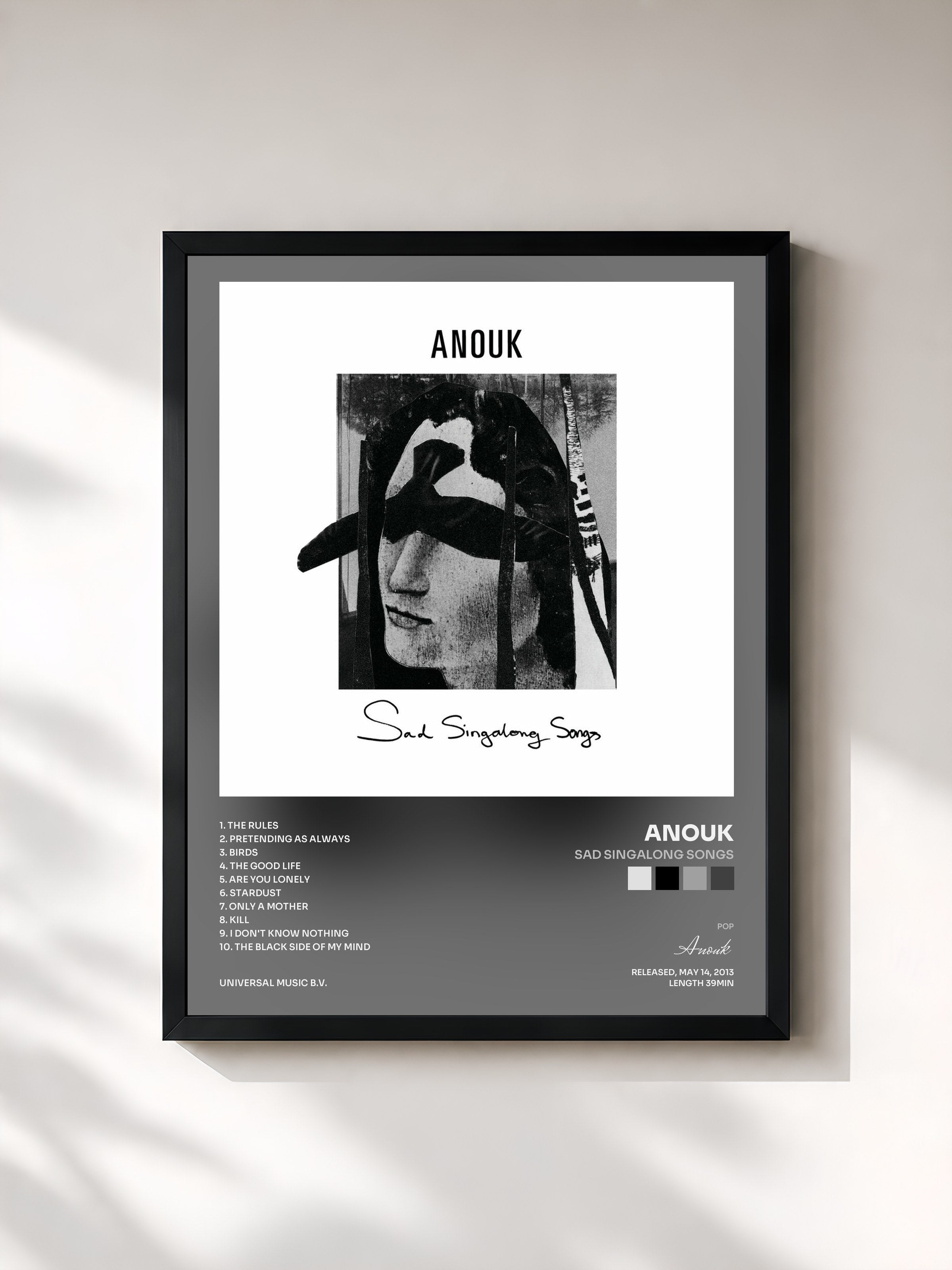#noir Tableau de l'album Sad Singalong Songs de Anouk, cadre noir, imprimé et encadré en France