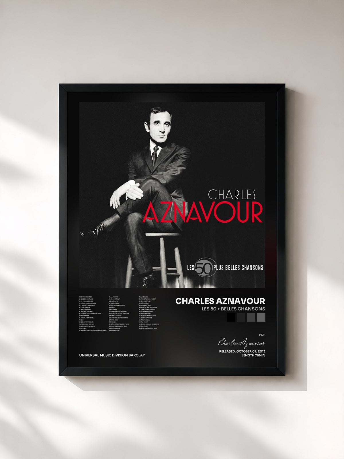 #noir Tableau de l'album Les 50 + Belles Chansons de Charles Aznavour, cadre noir, imprimé et encadré en France