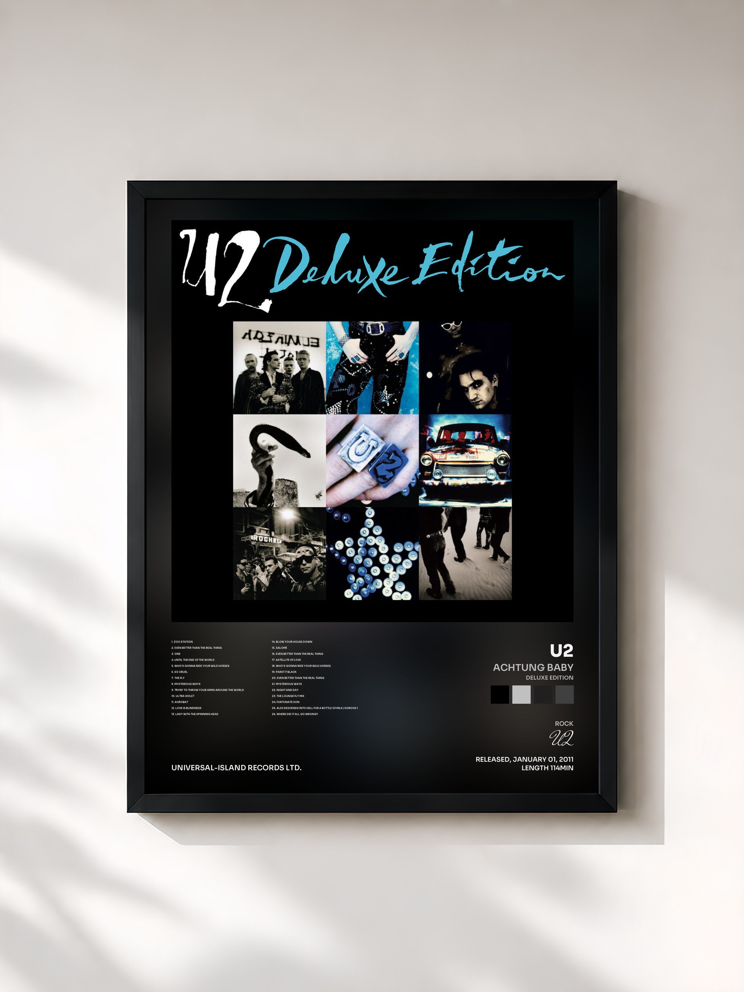 #noir Achtung Baby (Deluxe Edition) by U2 as a framed art print, black frame, printed and framed in France