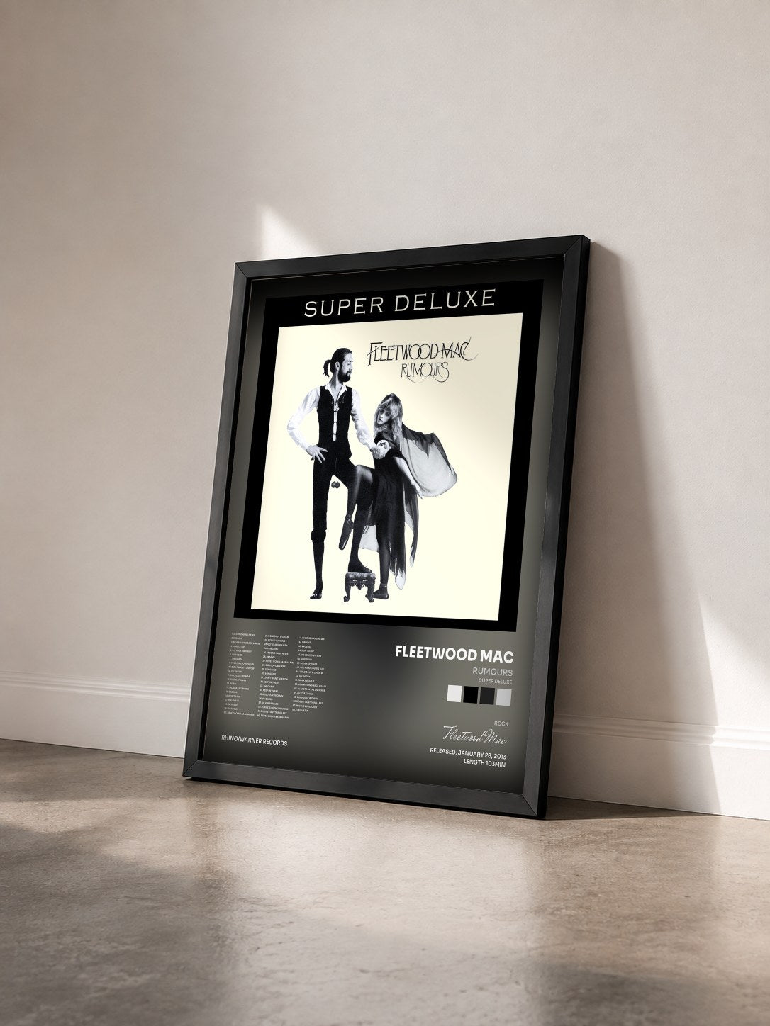 #noir Rumours (Super Deluxe) de Fleetwood Mac en lámina enmarcada vista de tres cuartos, marco negro