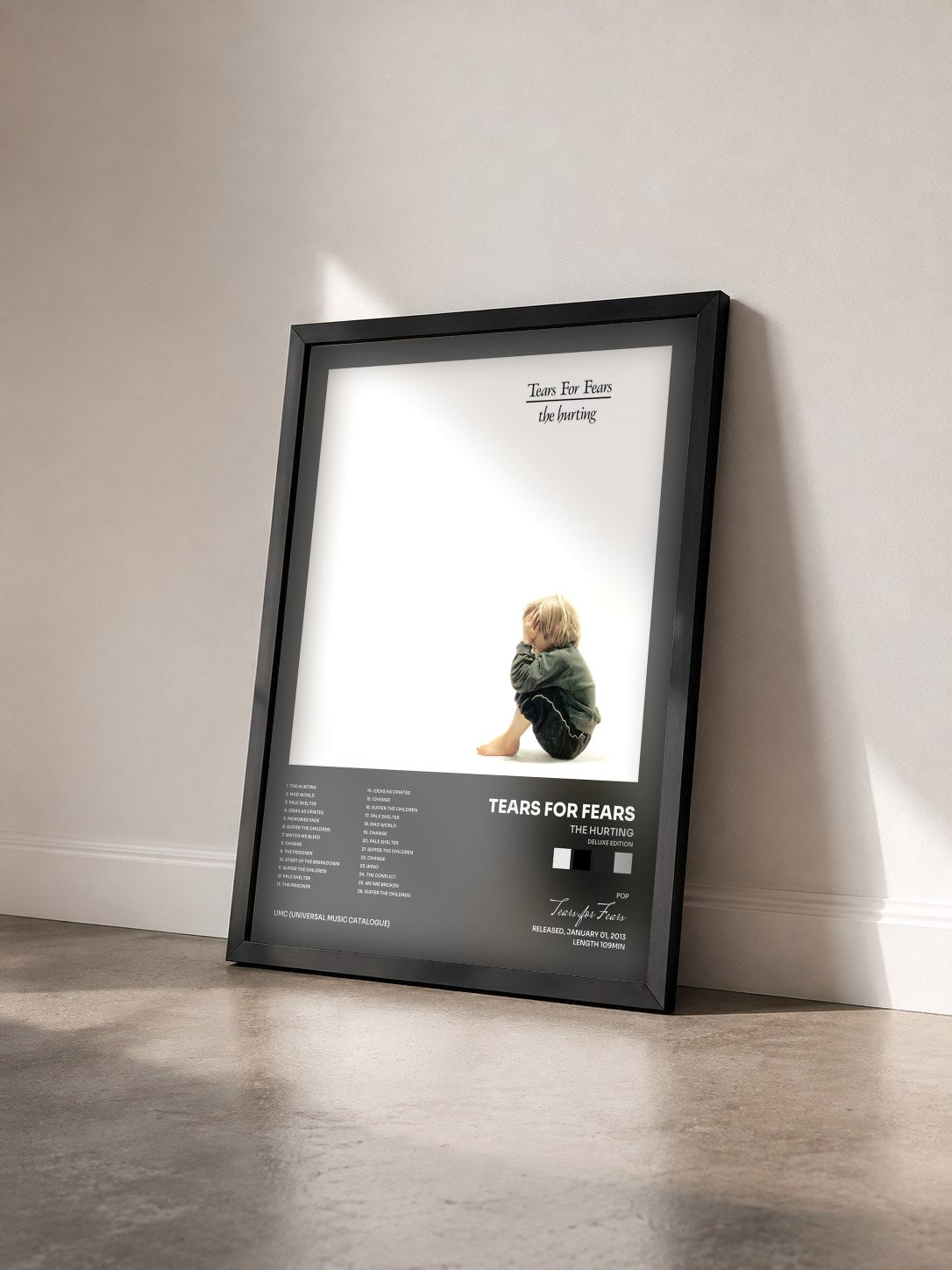 #noir The Hurting (Deluxe Edition) by Tears for Fears as a framed art print seen at an angle, black frame