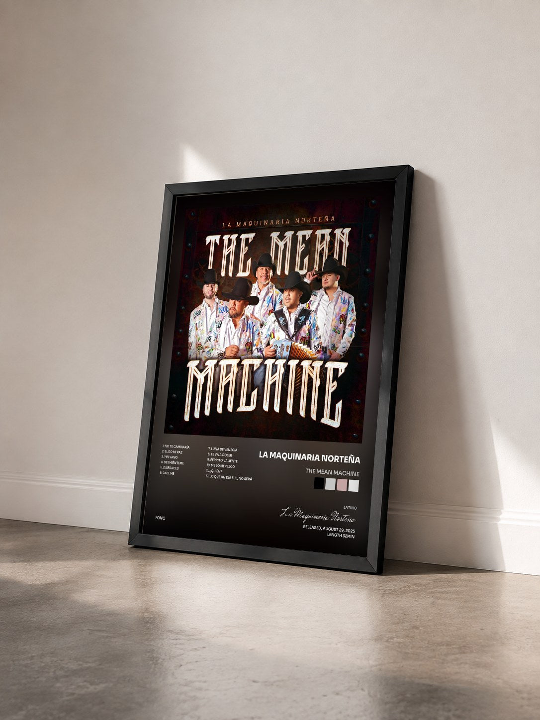 #noir Tableau de l'album The Mean Machine de La Maquinaria Norteña vu de trois quarts, cadre noir