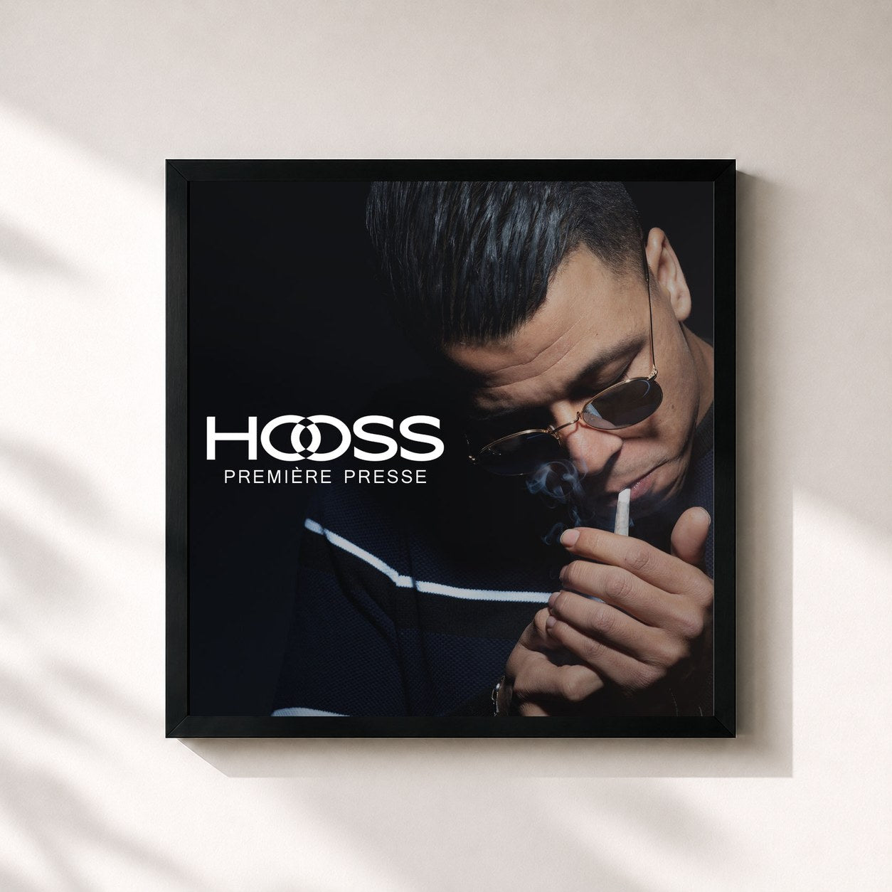 #noir Première Presse by Hooss as a square framed art print, black 32x32 cm frame