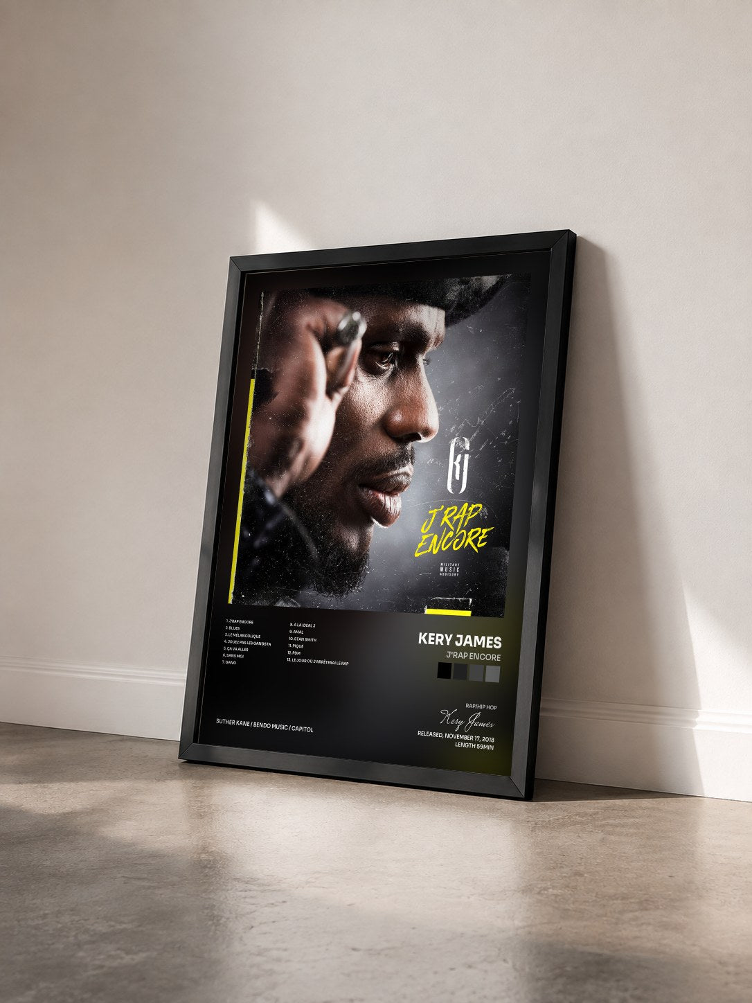 #noir J'rap encore by Kery James as a framed art print seen at an angle, black frame
