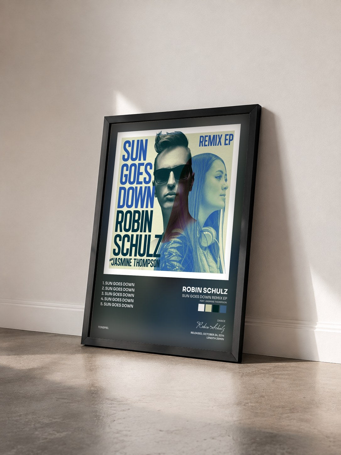 #noir Tableau de l'album Sun Goes Down Remix EP (feat. Jasmine Thompson) de Robin Schulz vu de trois quarts, cadre noir