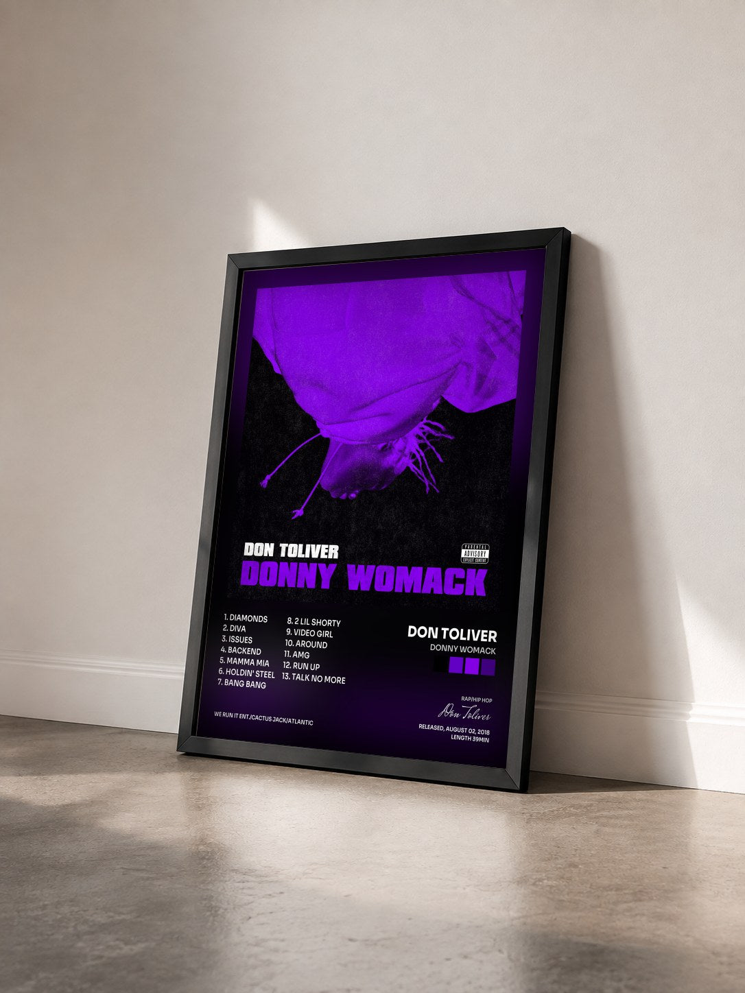 #noir Tableau de l'album Donny Womack de Don Toliver vu de trois quarts, cadre noir