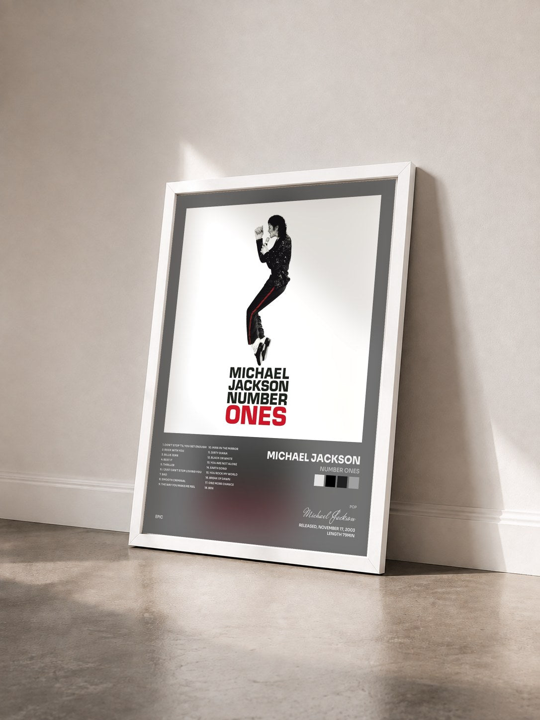 #blanc Tableau de l'album Number Ones de Michael Jackson vu de trois quarts, cadre blanc