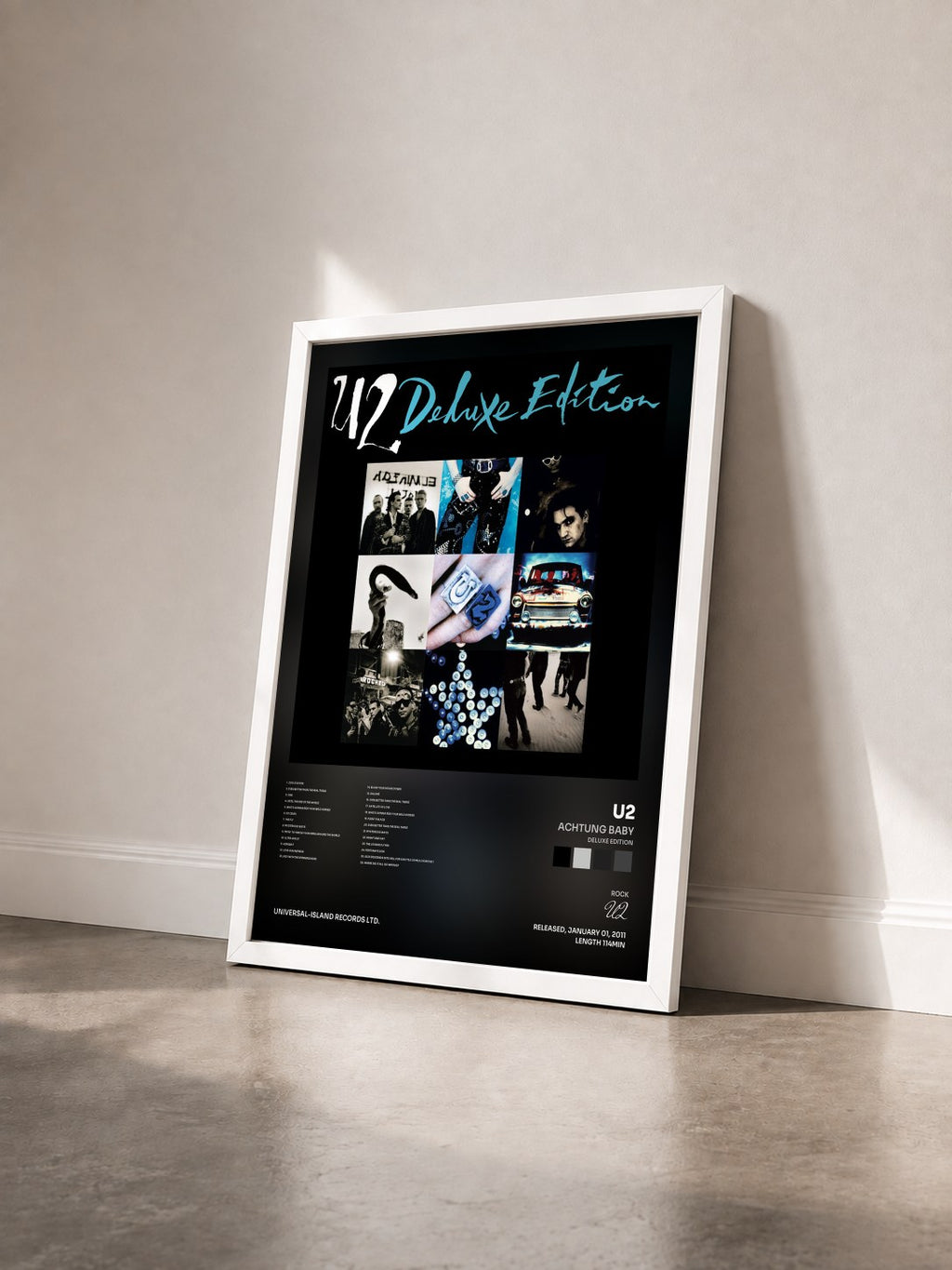#blanc Tableau de l'album Achtung Baby (Deluxe Edition) de U2 vu de trois quarts, cadre blanc