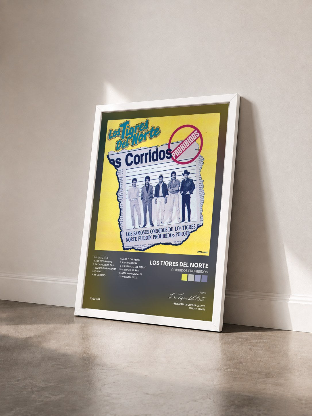 #blanc Tableau de l'album Corridos Prohibidos de Los Tigres del Norte vu de trois quarts, cadre blanc