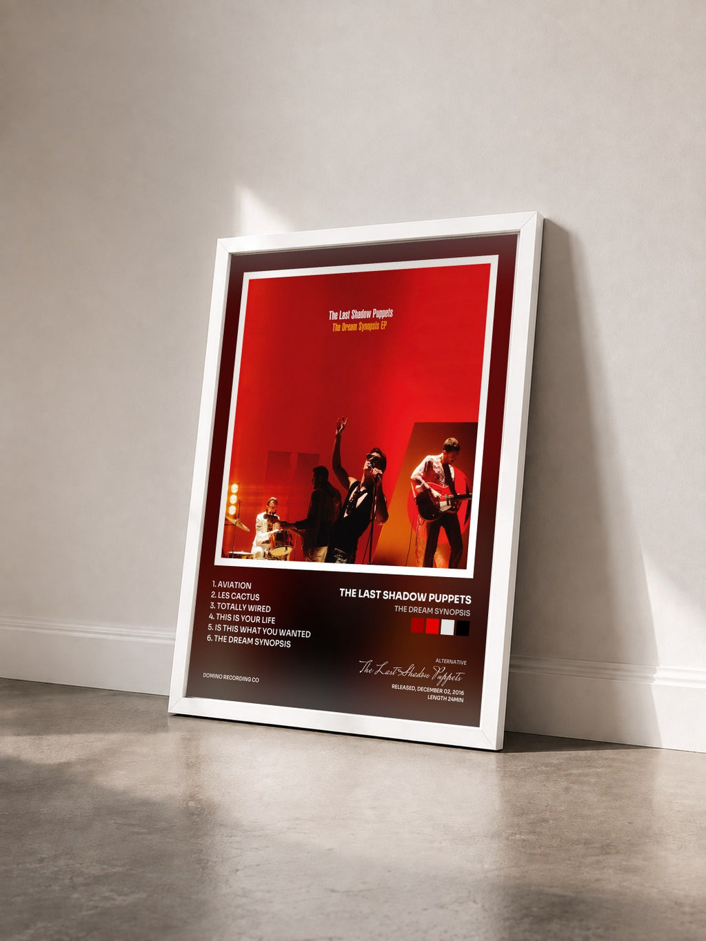 #blanc Tableau de l'album The Dream Synopsis de The Last Shadow Puppets vu de trois quarts, cadre blanc