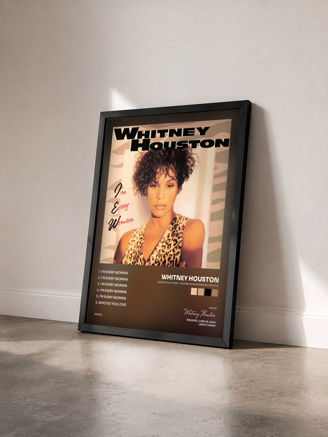#noir Tableau de l'album Dance Vault Mixes - I'm Every Woman/Who Do You Love de Whitney Houston vu de trois quarts, cadre noir