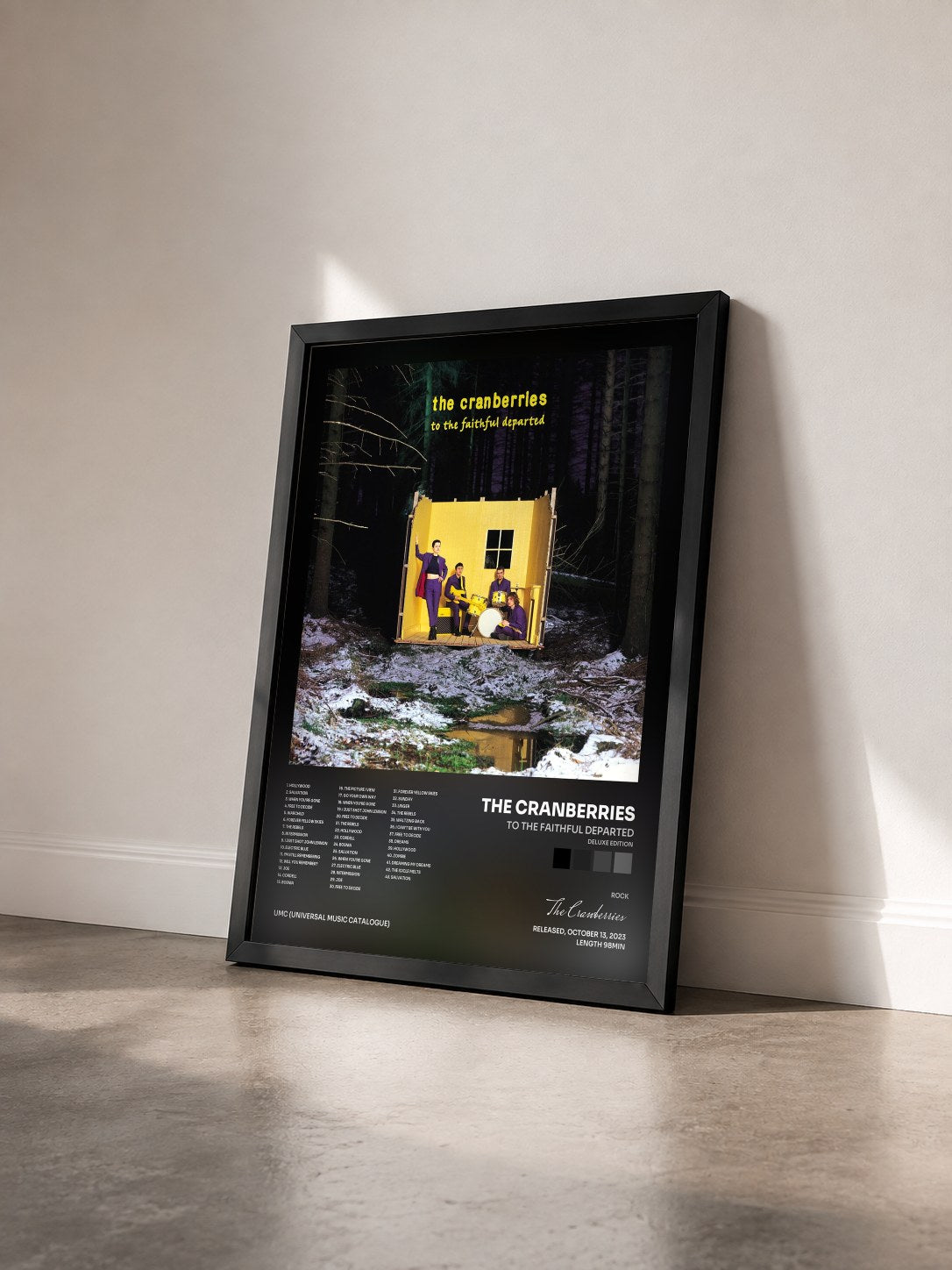 #noir To The Faithful Departed (Deluxe Edition) by The Cranberries as a framed art print seen at an angle, black frame