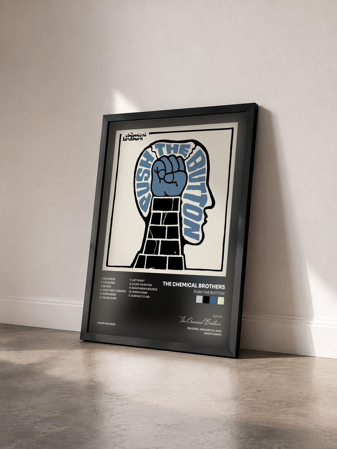 #noir Tableau de l'album Push The Button de The Chemical Brothers vu de trois quarts, cadre noir