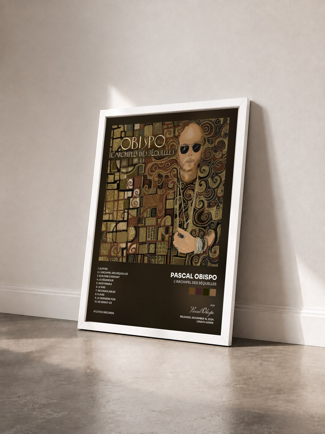 #blanc L'archipel des séquelles by Pascal Obispo as a framed art print seen at an angle, white frame