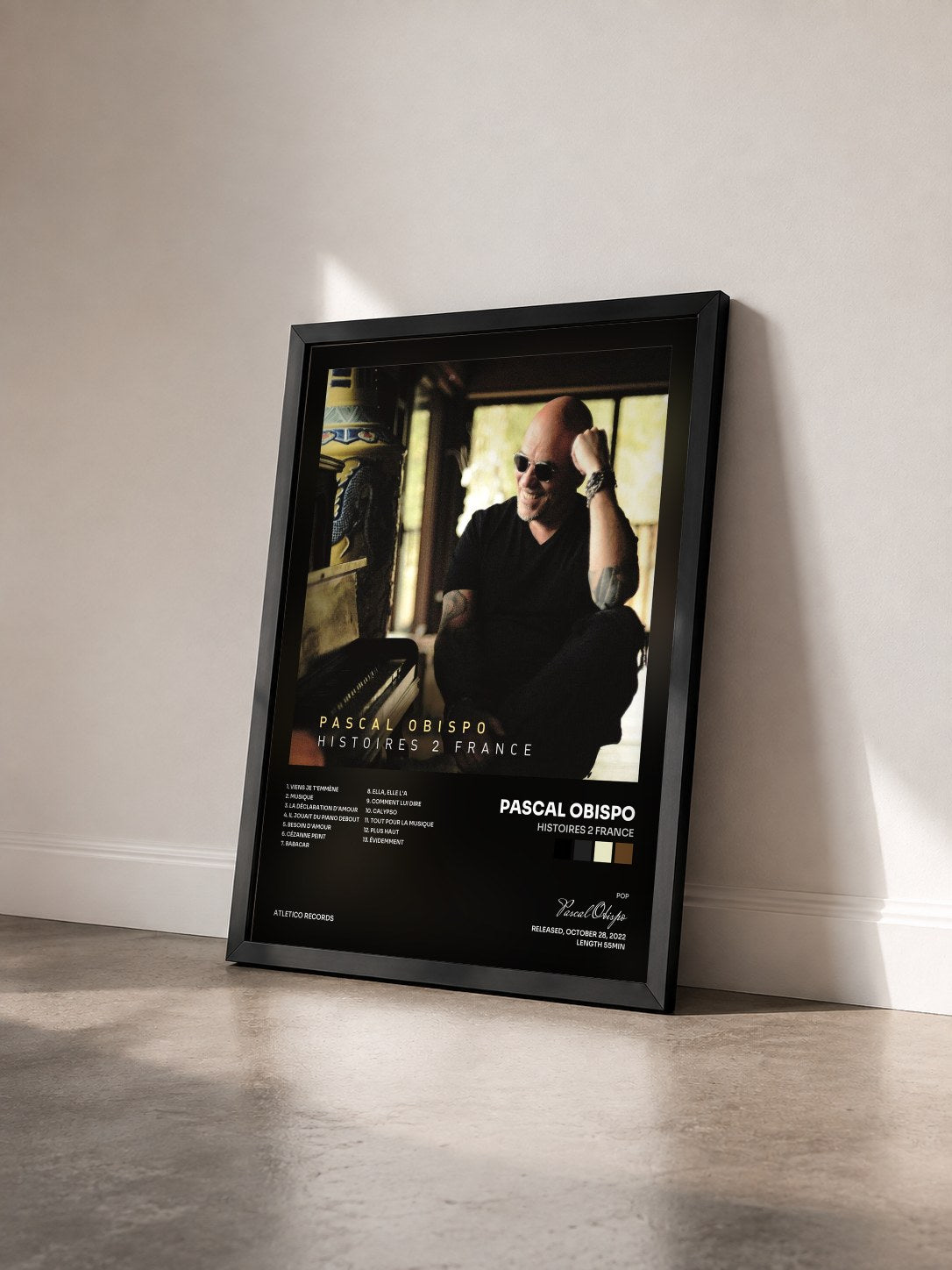 #noir Histoires 2 France by Pascal Obispo as a framed art print seen at an angle, black frame