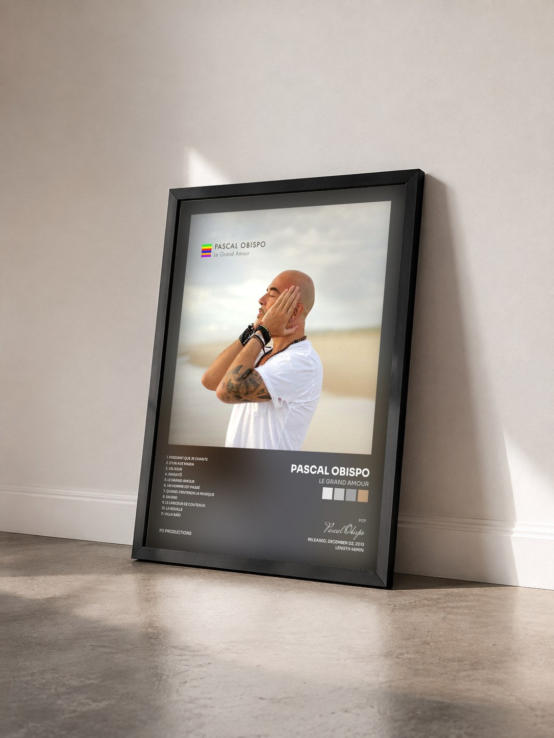 #noir Le Grand Amour by Pascal Obispo as a framed art print seen at an angle, black frame