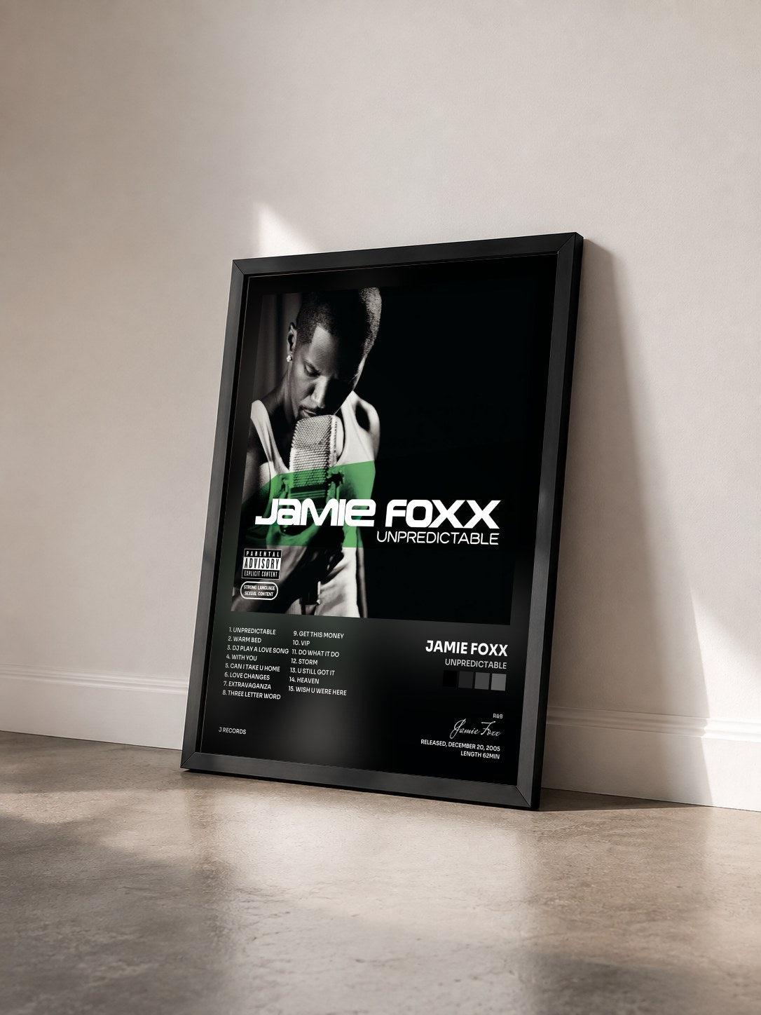 #noir Tableau de l'album Unpredictable de Jamie Foxx vu de trois quarts, cadre noir