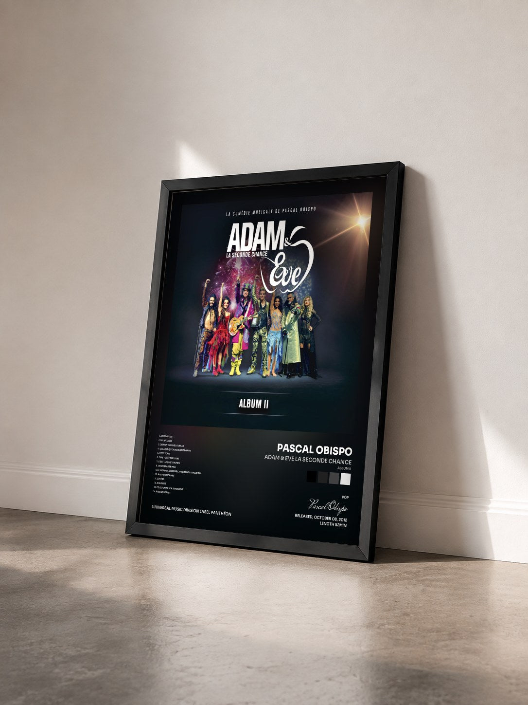 #noir Adam & Eve La Seconde Chance (Album II) by Pascal Obispo as a framed art print seen at an angle, black frame
