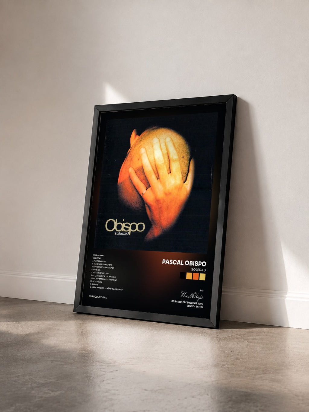 #noir Tableau de l'album Soledad de Pascal Obispo vu de trois quarts, cadre noir