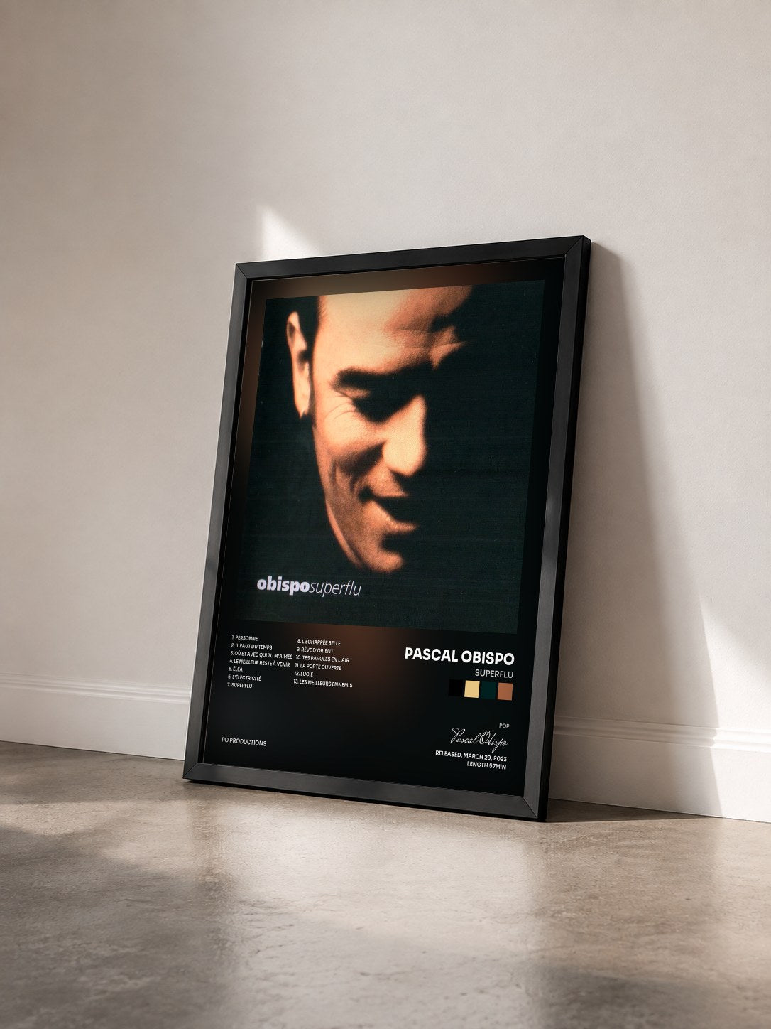 #noir Superflu by Pascal Obispo as a framed art print seen at an angle, black frame
