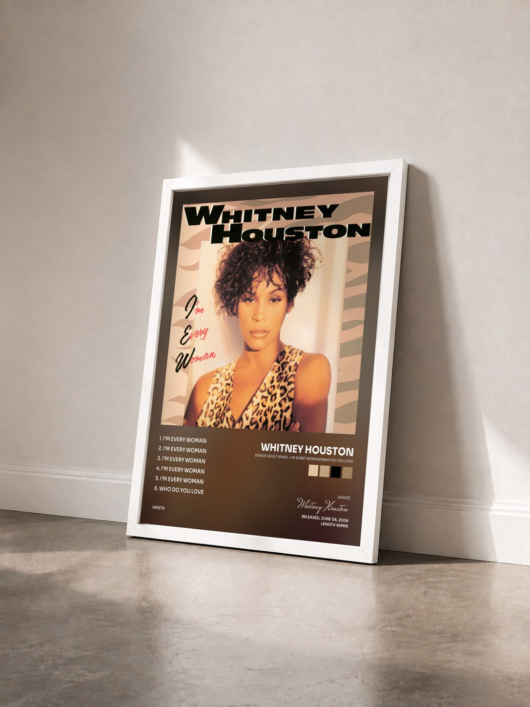 #blanc Tableau de l'album Dance Vault Mixes - I'm Every Woman/Who Do You Love de Whitney Houston vu de trois quarts, cadre blanc