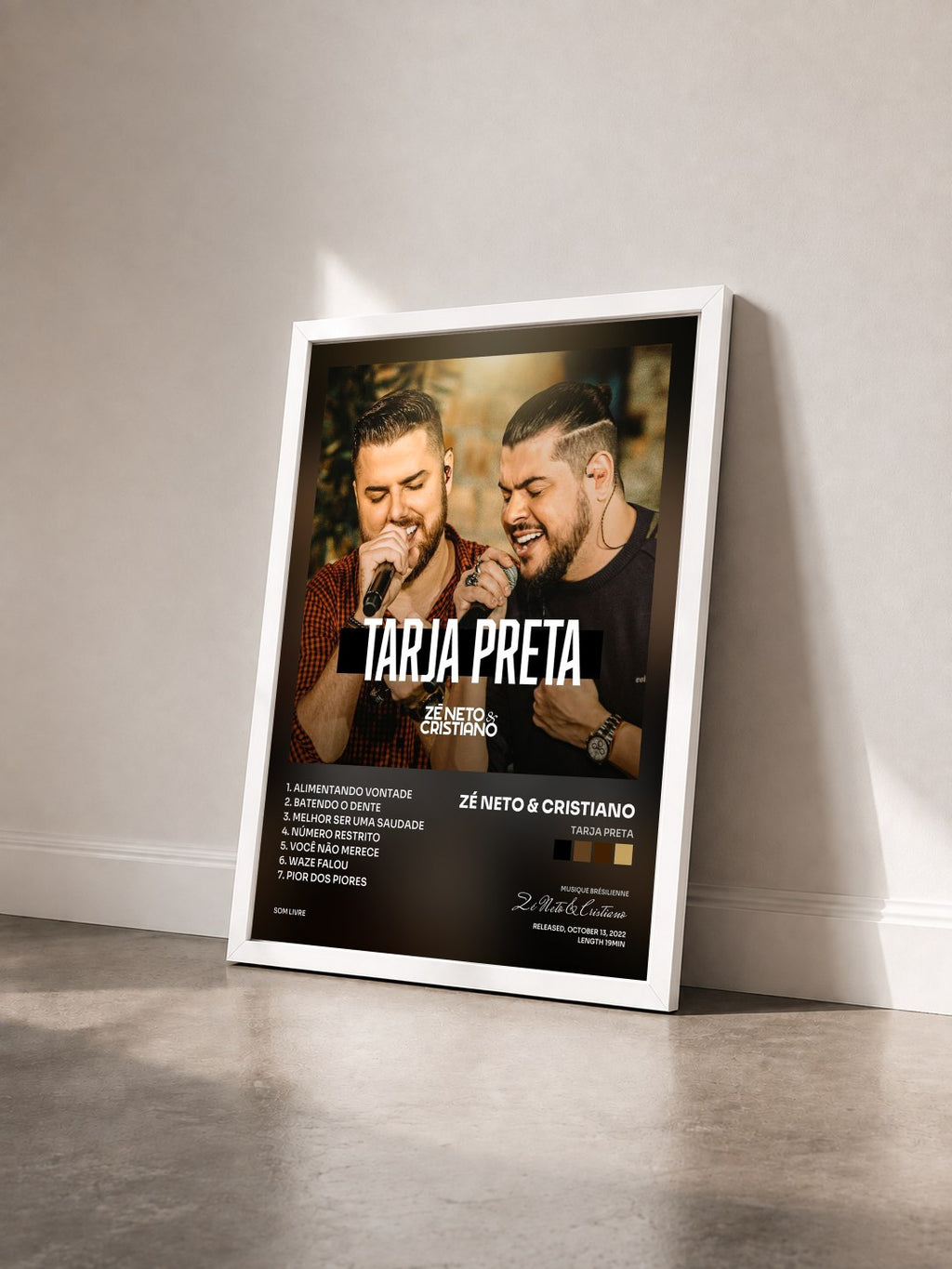 #blanc Tableau de l'album Tarja Preta de Zé Neto & Cristiano vu de trois quarts, cadre blanc