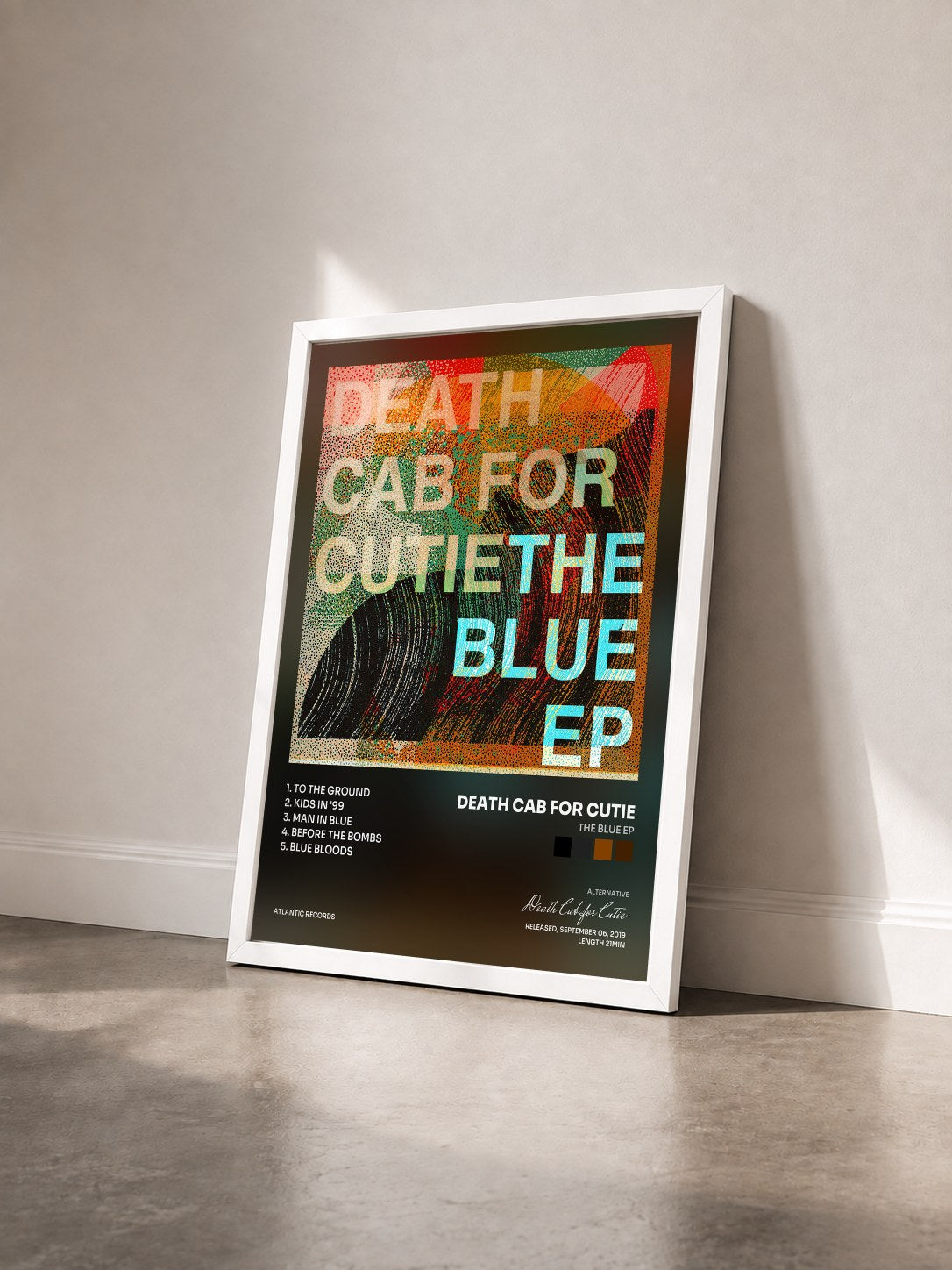 #blanc Tableau de l'album The Blue EP de Death Cab for Cutie vu de trois quarts, cadre blanc