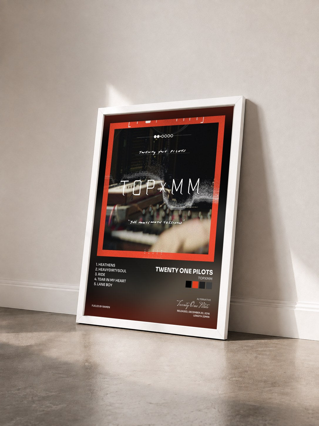 #blanc TOPxMM by Twenty One Pilots as a framed art print seen at an angle, white frame