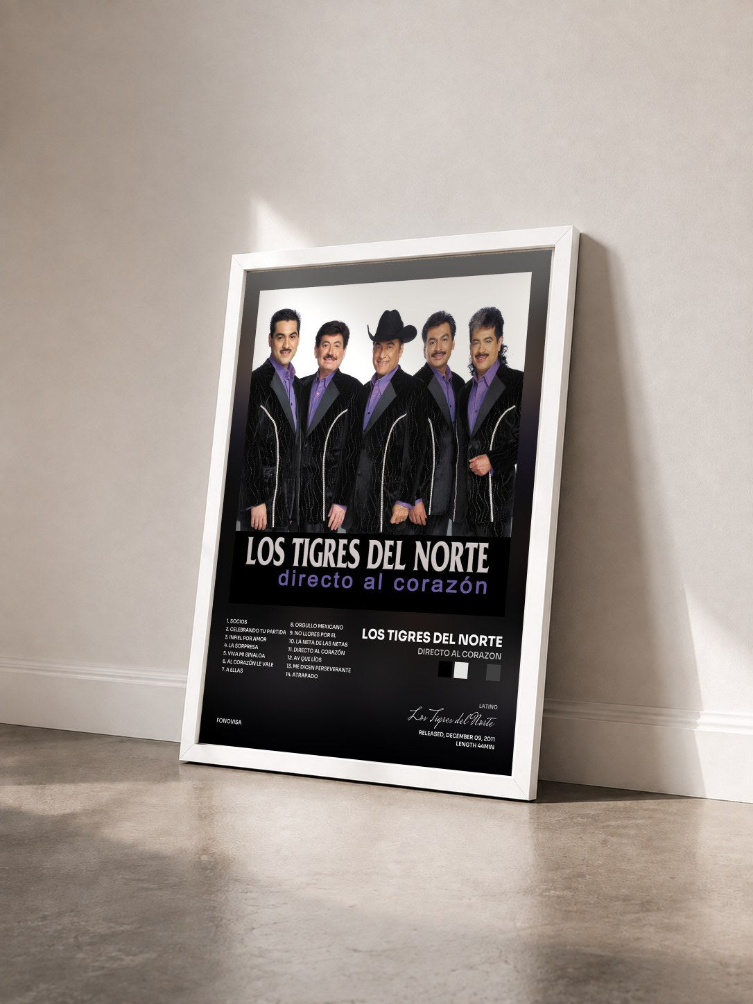 #blanc Tableau de l'album Directo Al Corazon de Los Tigres del Norte vu de trois quarts, cadre blanc