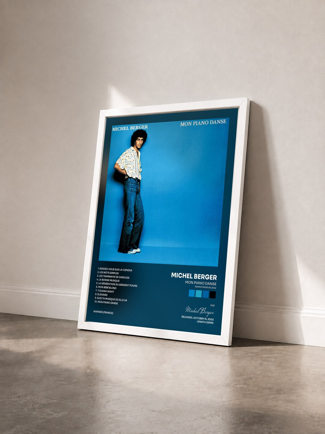 #blanc Tableau de l'album Mon piano danse (Remasterisé en 2002) de Michel Berger vu de trois quarts, cadre blanc