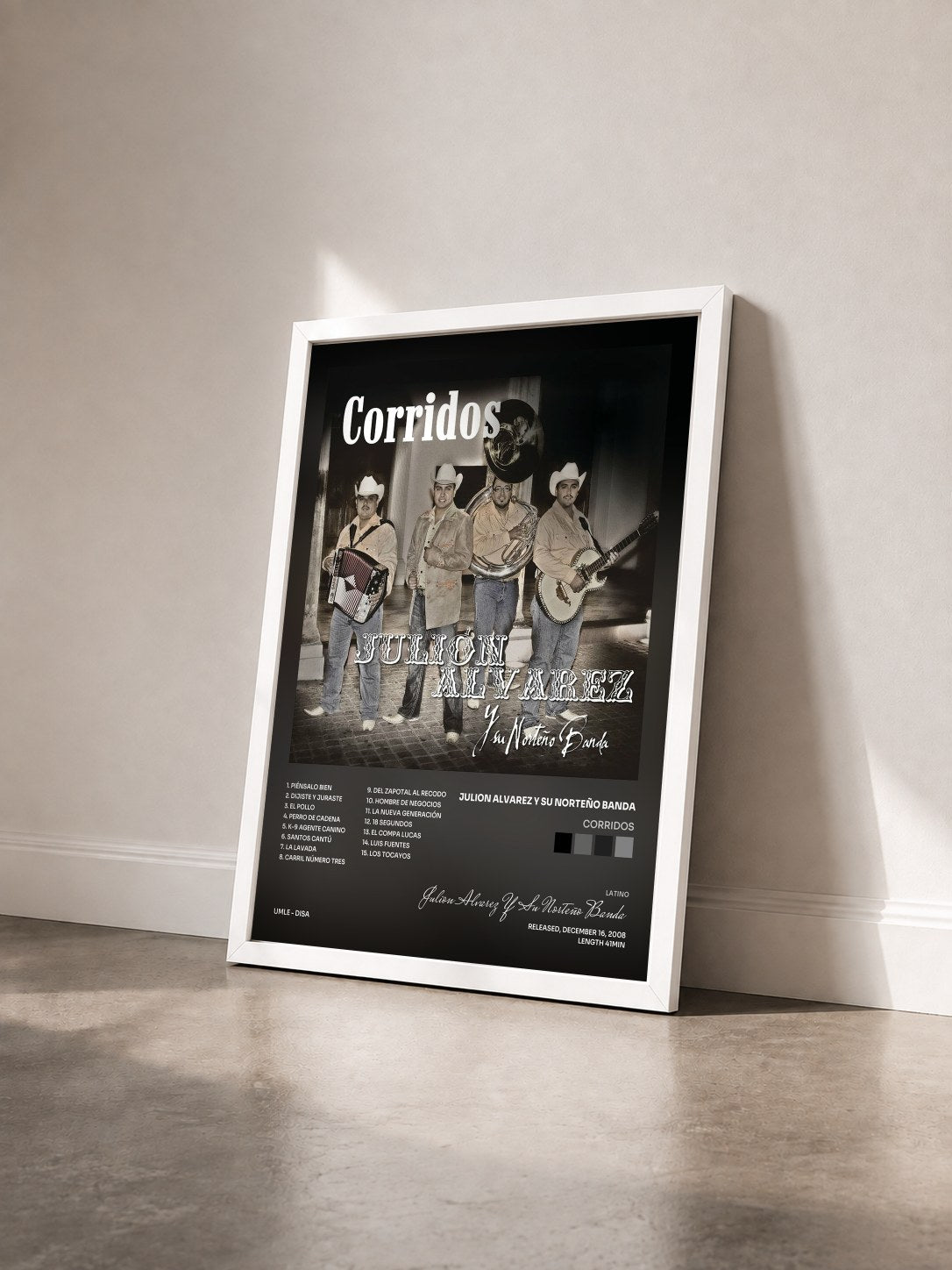#blanc Tableau de l'album Corridos de Julion Alvarez Y Su Norteño Banda vu de trois quarts, cadre blanc