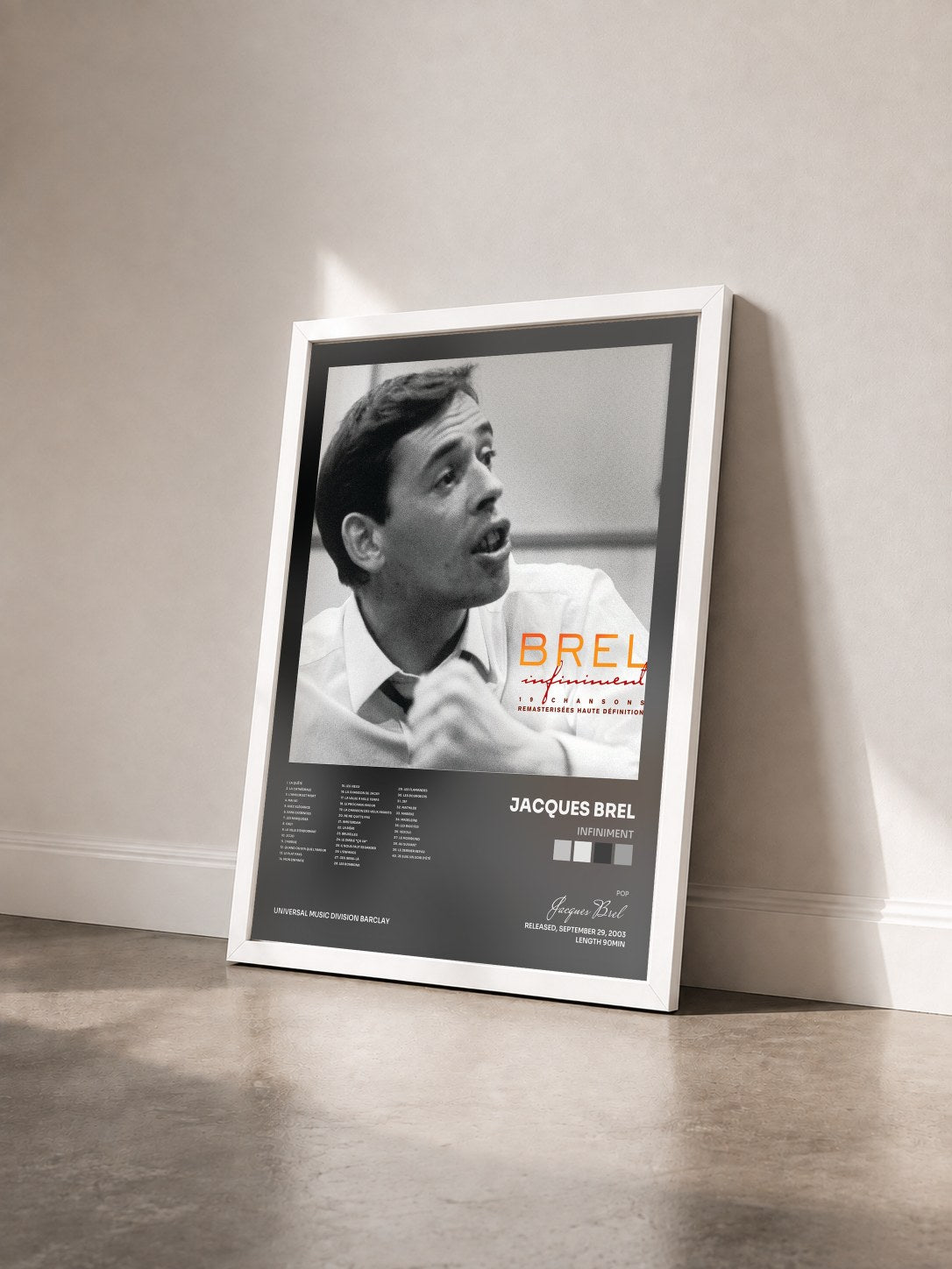 #blanc Tableau de l'album Infiniment de Jacques Brel vu de trois quarts, cadre blanc