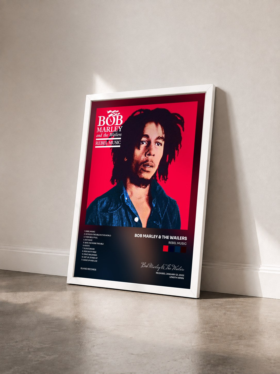#blanc Tableau de l'album Rebel Music de Bob Marley & The Wailers vu de trois quarts, cadre blanc