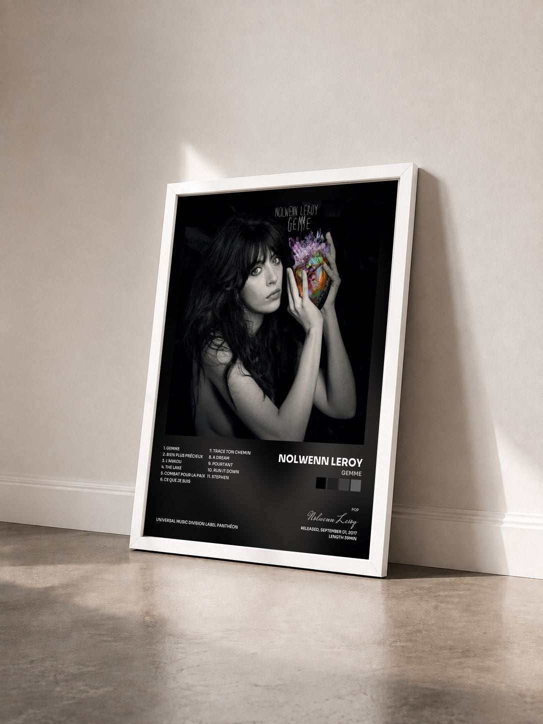 #blanc Gemme by Nolwenn Leroy as a framed art print seen at an angle, white frame