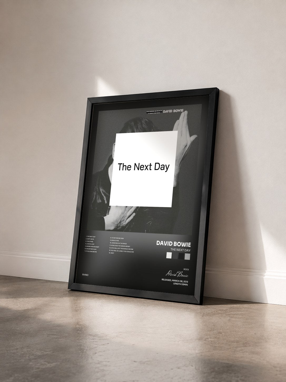 #noir Tableau de l'album The Next Day de David Bowie vu de trois quarts, cadre noir