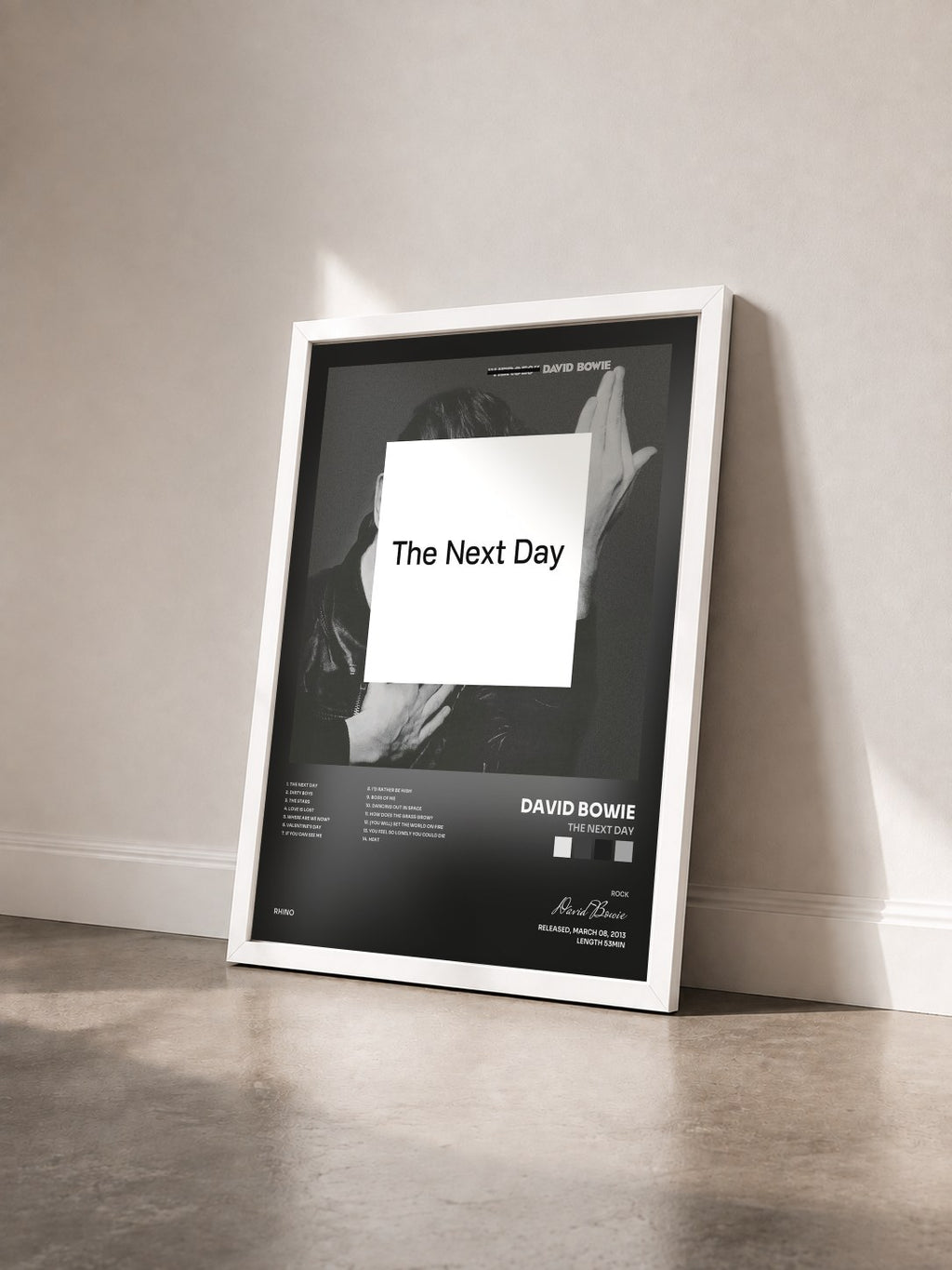 #blanc Tableau de l'album The Next Day de David Bowie vu de trois quarts, cadre blanc