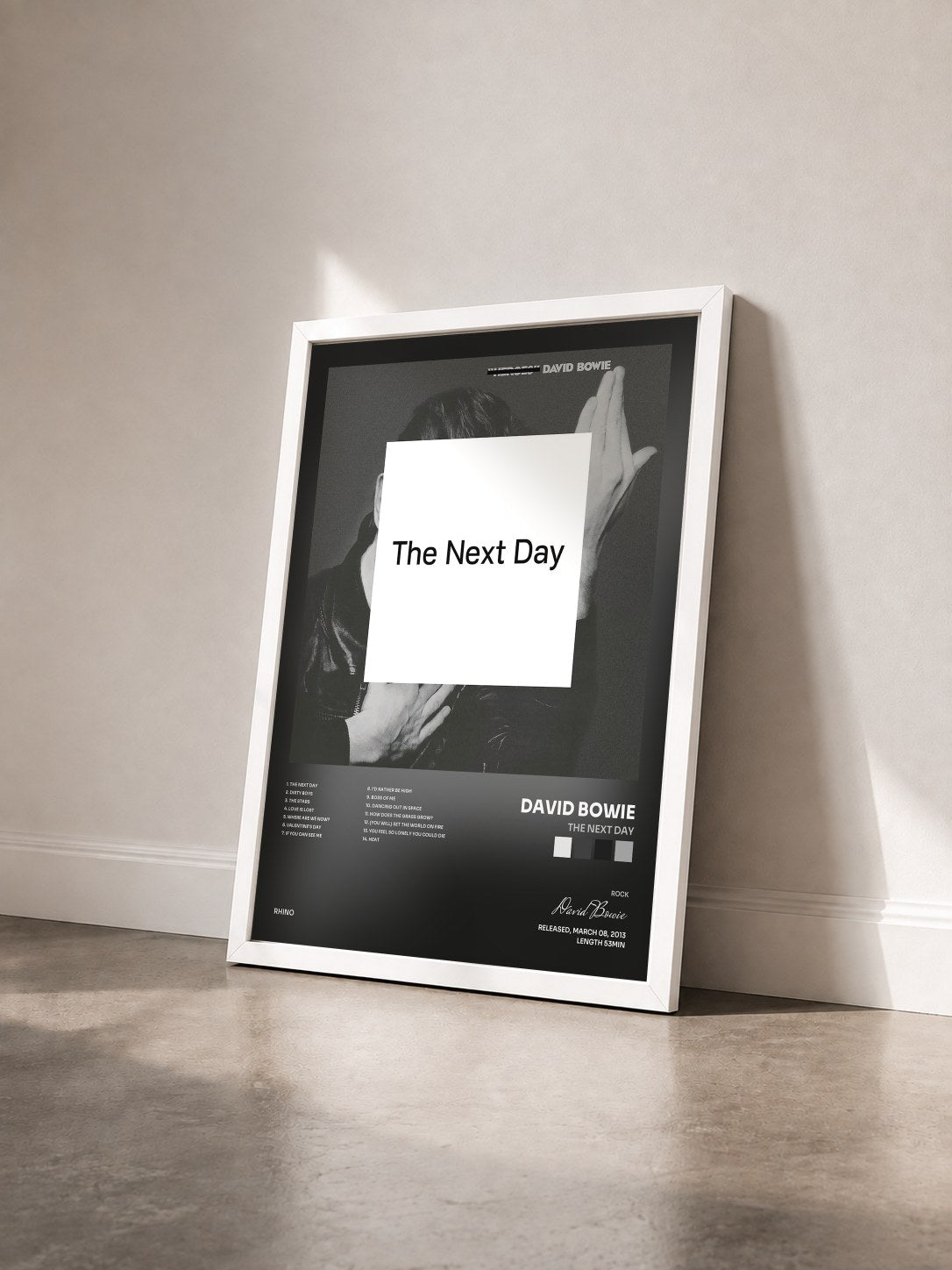 #blanc Tableau de l'album The Next Day de David Bowie vu de trois quarts, cadre blanc
