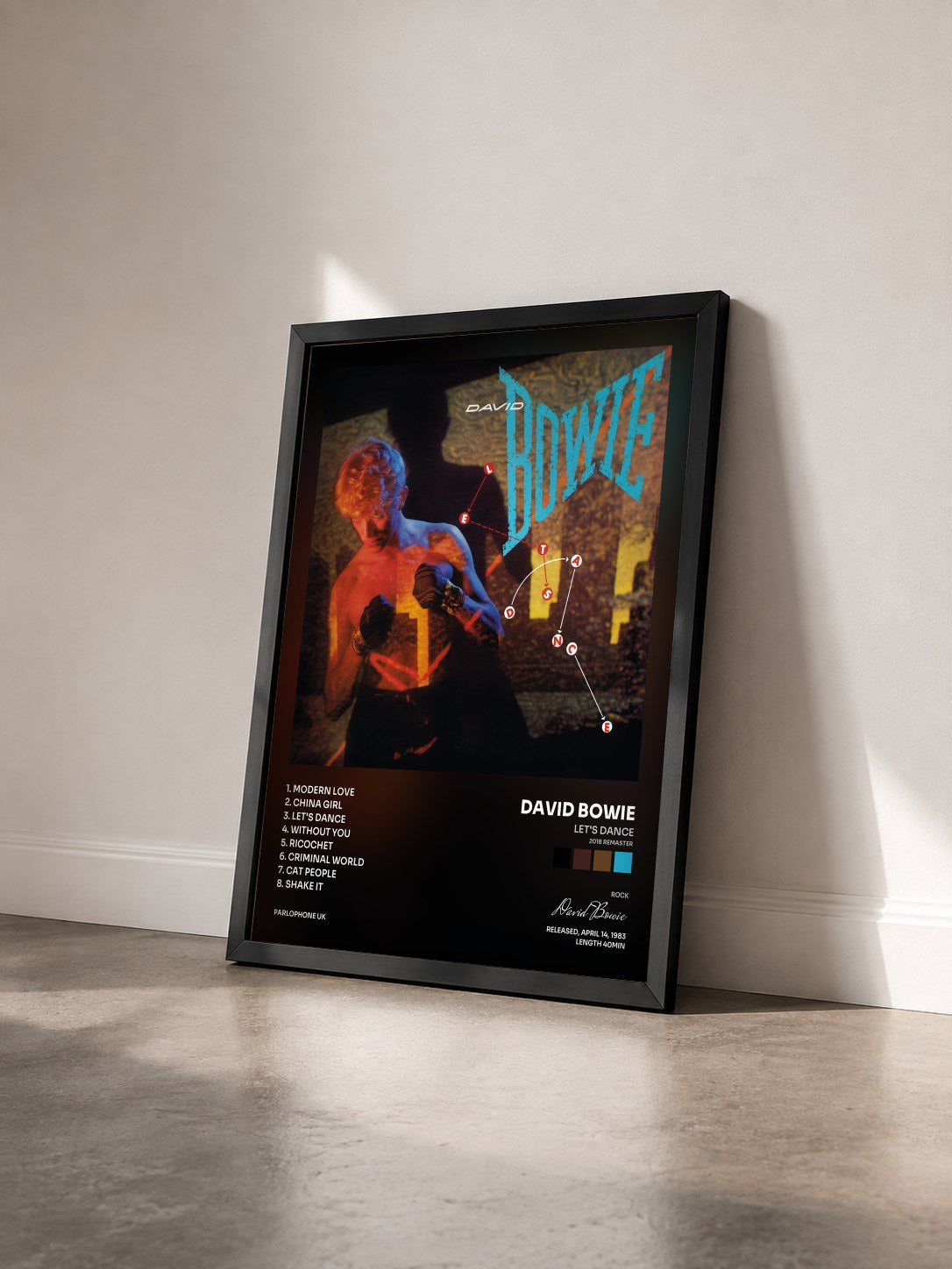 #noir Tableau de l'album Let's Dance (2018 Remaster) de David Bowie vu de trois quarts, cadre noir