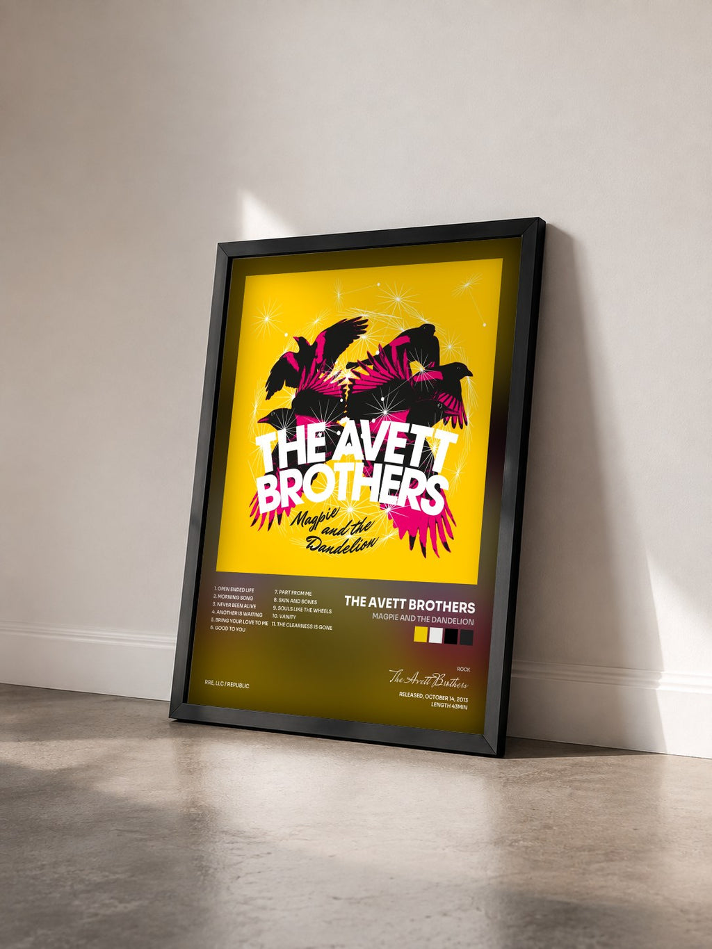 #noir Tableau de l'album Magpie And The Dandelion de The Avett Brothers vu de trois quarts, cadre noir