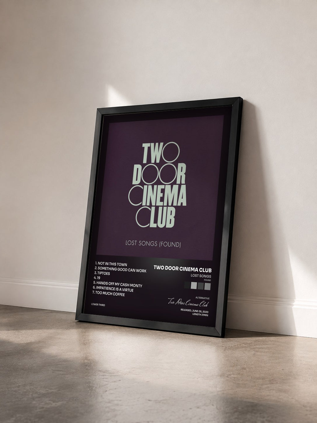 #noir Tableau de l'album Lost Songs (Found) de Two Door Cinema Club vu de trois quarts, cadre noir