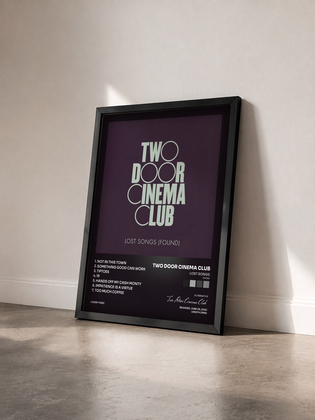 #noir Tableau de l'album Lost Songs (Found) de Two Door Cinema Club vu de trois quarts, cadre noir