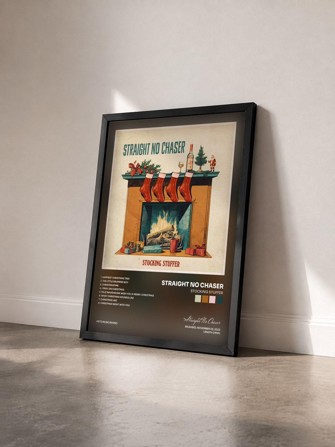 #noir Tableau de l'album Stocking Stuffer de Straight No Chaser vu de trois quarts, cadre noir